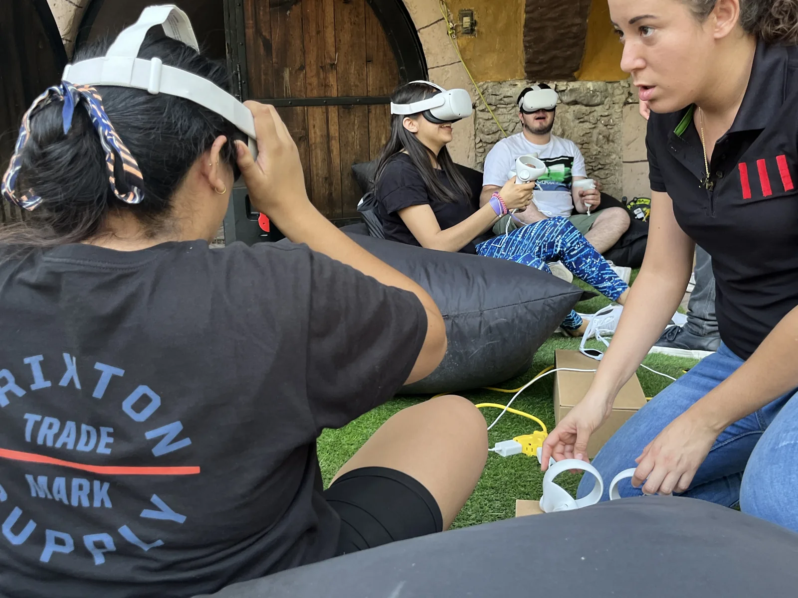 Guests wearing virtual reality headsets